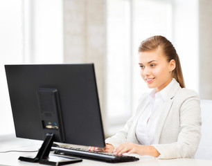 businesswoman with computer in office