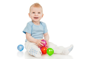 Fototapeta premium The little boy with toy balls