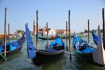 Obraz na płótnie Canvas View of gondolas in front of San Giorgio Maggiore island