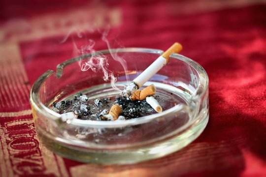 Ashtray with cigarette butts
