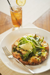 flatbread with mushrooms, goat cheese,sausage with ice tea