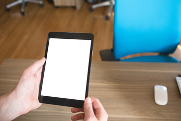 Man holding tablet pc at work.