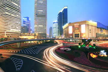 Rainbow ring highway at night with light trails in shanghai Luji