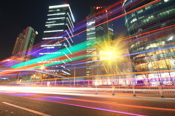 Fototapeta na wymiar Rainbow light highway at night in Shanghai