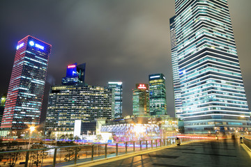 Fototapeta na wymiar Look up modern office buildings in Shanghai