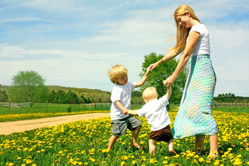 Mother and Children Playing Outside