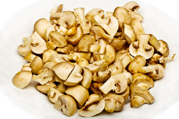 Button mushrooms on a white background