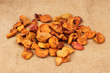 Dried fruit on burlap background