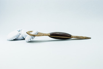 Close up of a golden bottle opener pattern Thailand