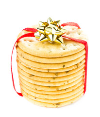 Sweet Christmas cookies  tied with red ribbon solated on white b