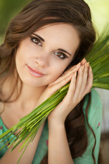 Naklejka premium beautiful teenager woman girl smiling outdoors