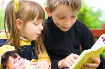 Children reading the book