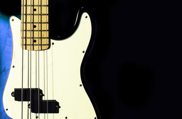 bass guitar on a black background
