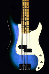 Obraz na płótnie Canvas bass guitar on a black background