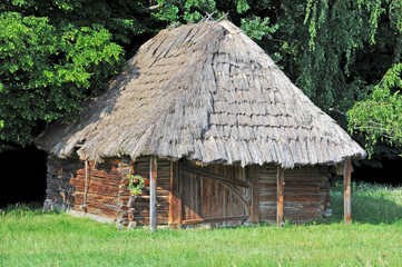 Fototapeta na wymiar Ancient traditional ukrainian rural wooden barn