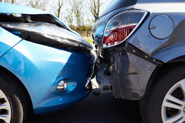 Fototapeta na wymiar Two Cars Involved In Traffic Accident