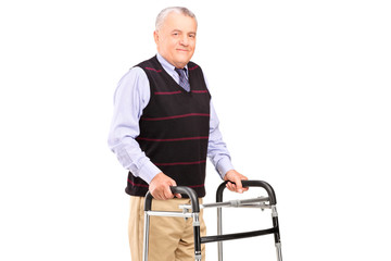 Mature gentleman using a walker