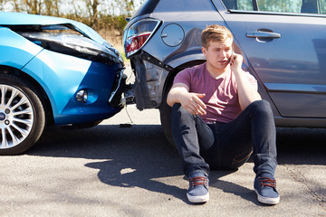 Driver Making Phone Call After Traffic Accident