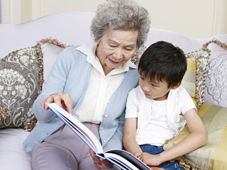 grandma reading a story to grandson