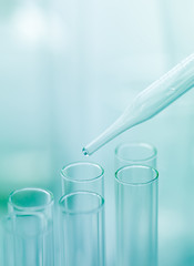 Few empty medical containers and a pipette