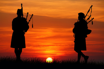 pipers at sunset - obrazy, fototapety, plakaty