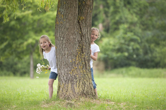 Little Girls Playing Hide And Seek