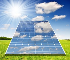 Solar energy panels against sunny sky
