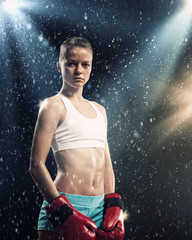 Obraz premium Young boxer woman