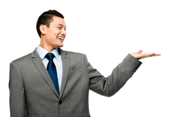 Asian businessman showing empty copy space isolated on white bac