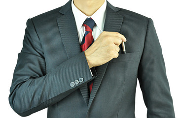 Businessman picking a pen from the pocket