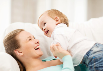 Obraz na płótnie Canvas happy mother with adorable baby