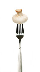 fresh champignon mushroom on fork
