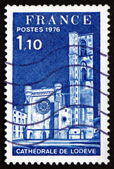 Postage stamp France 1976 shows Lodeve Cathedral, Herault