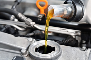 Motor oil, car engine close up - 53660853