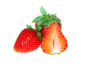 Strawberries with leaves, isolated on a white background.