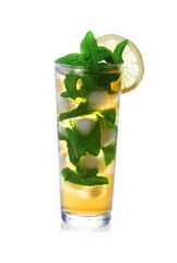 Glass of ice tea with sliced lemon and mint