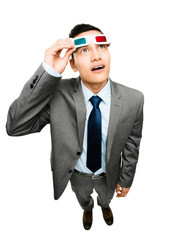 full length asian businessman wearing 3d glasses movie white bac