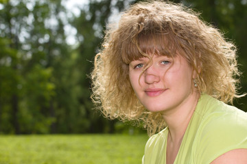 Natural blonde with a voluminous hair