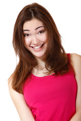 portrait of funny smiling girl in pink t-shirt
