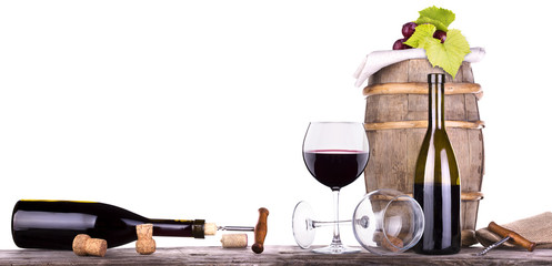 grapes on a barrel with corkscrew and wine glass