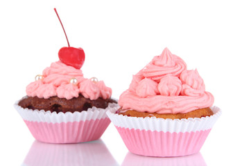 Delicious beautiful cupcakes isolated on white
