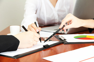 Close up of business people hands during teamwork
