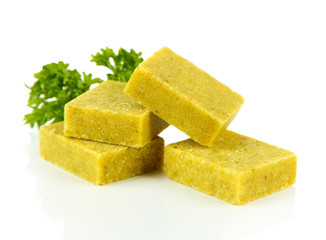 Bouillon cubes with parsley, isolated on white
