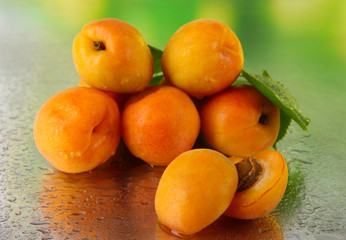 Apricots on nature background