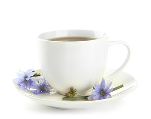 Cup of tea with chicory, isolated on white