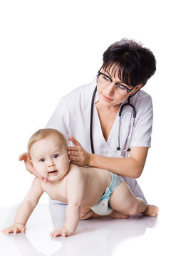 Beautiful Doctor And Baby On A White Background.