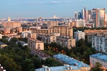 city in summer early evening