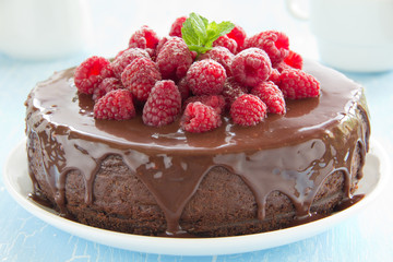 Chocolate cheesecake with raspberries.