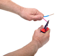 Electrician's hands using pliers