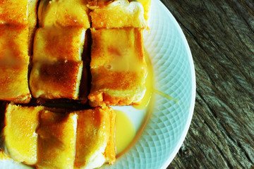 Toast - topped with condensed milk.